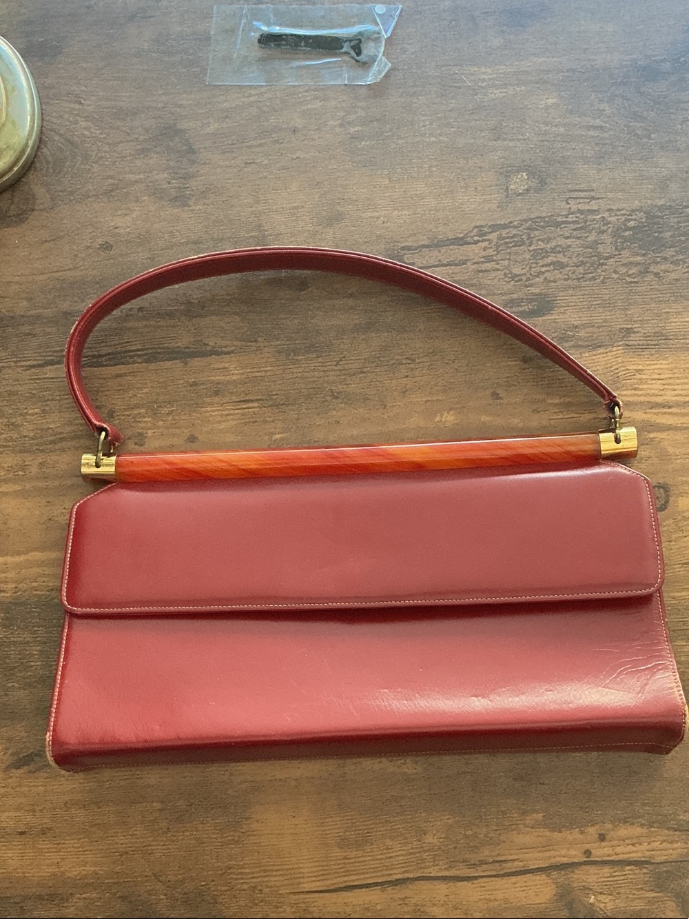 Classic Red Leather Shoulder Bag with Amber Accent